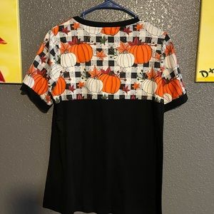 Cute pumpkin shirt. Worn once